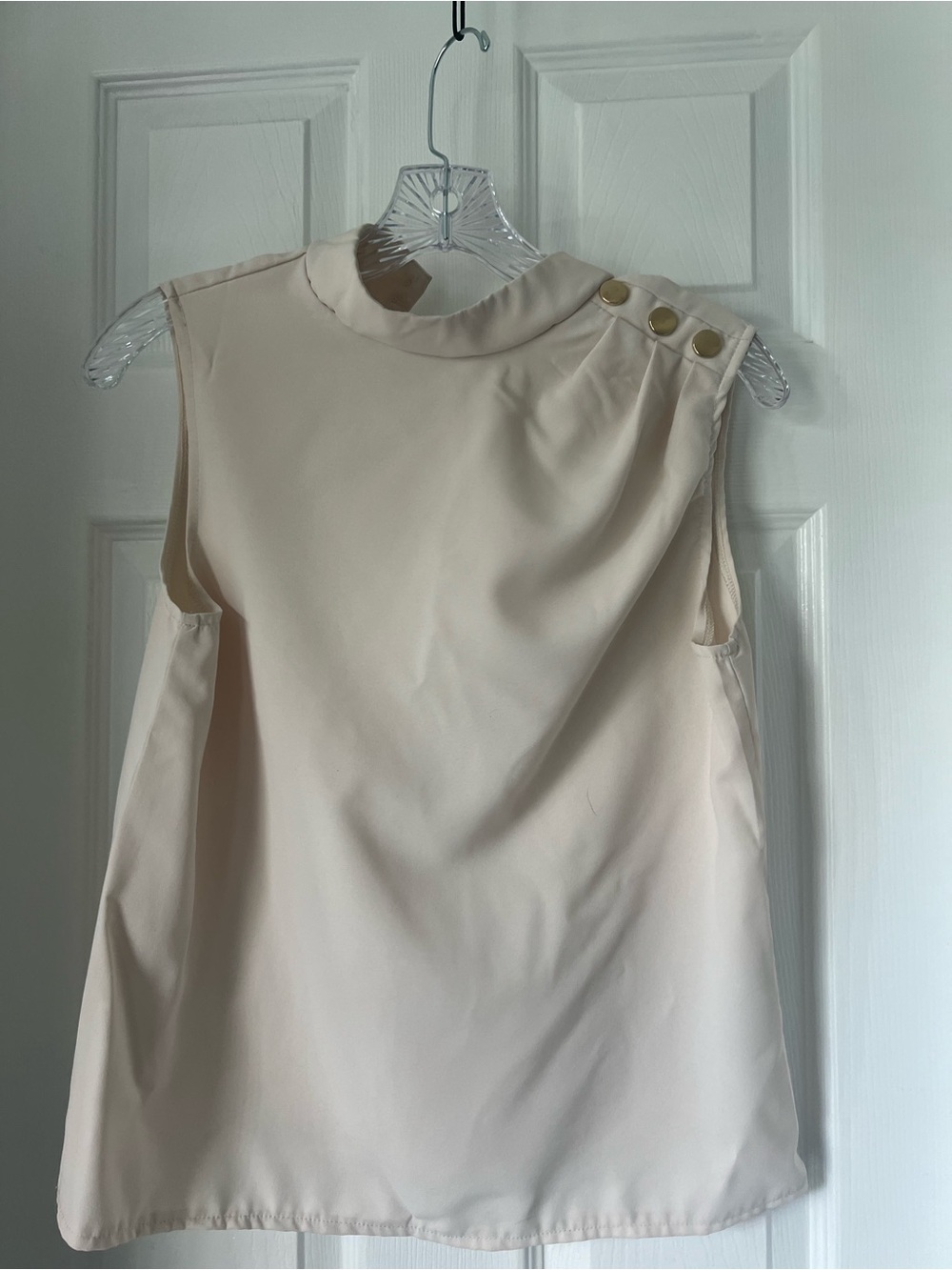 Sleeveless Cream Blouse with Shoulder Button Detail